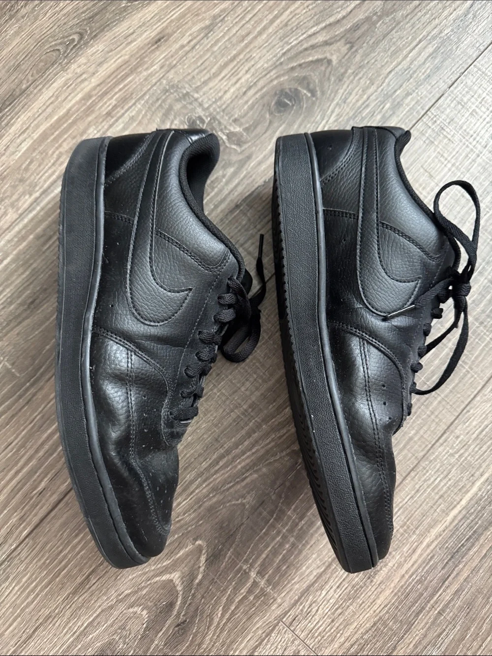 Nike Men’s All-Black Low-Top Leather Sneakers